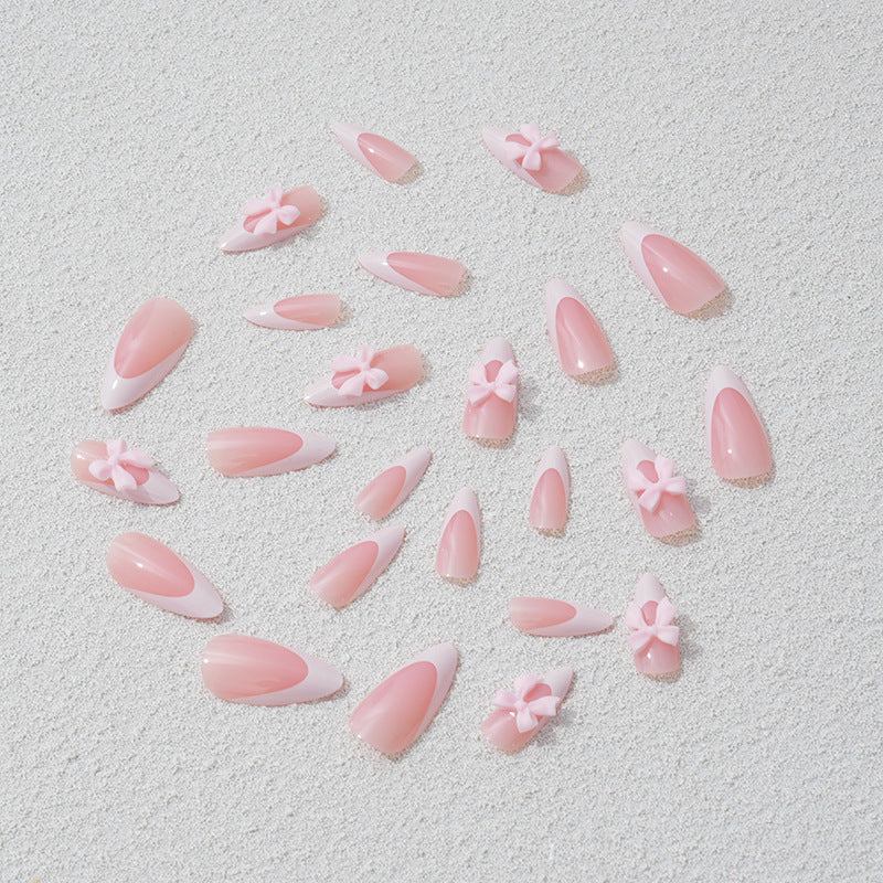 Nail art set with playful bow accents Kalsten