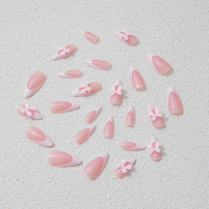 Nail art set with playful bow accents Kalsten