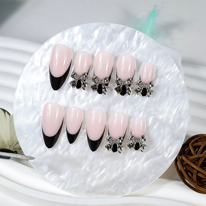 Nail art set with elegant tips and artistic embellishments Kalsten