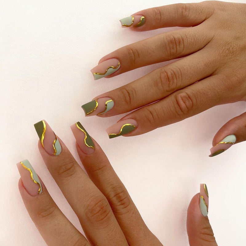 Artful Nail Extensions with Elegant Gold Decoration Design Kalsten