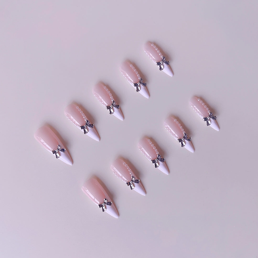 Elegant artificial nail set with 3D rhinestone details and pointed accents Kalsten