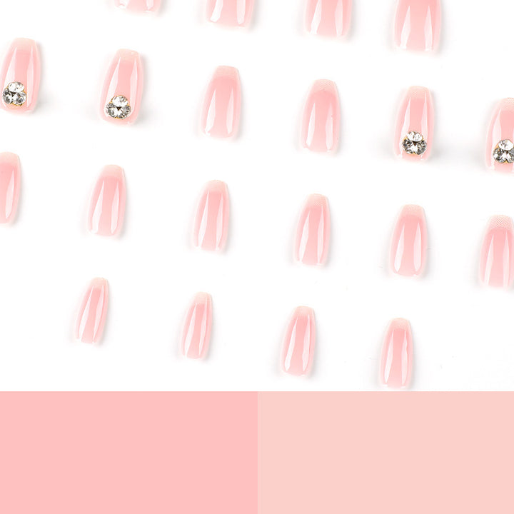 Artful nail extensions with elegant French tip and rhinestone embellishments Kalsten