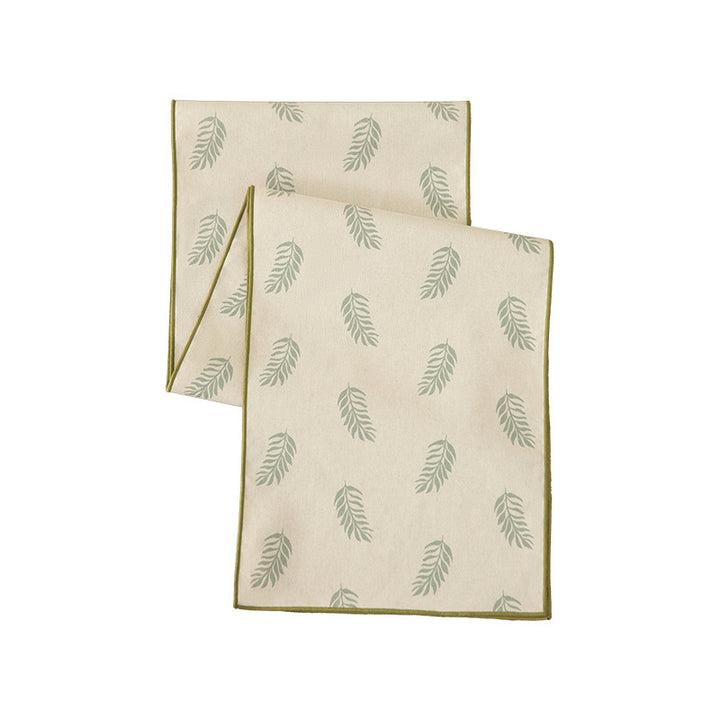 Woven table runner in botanical leaf pattern made of cotton blend Kalsten
