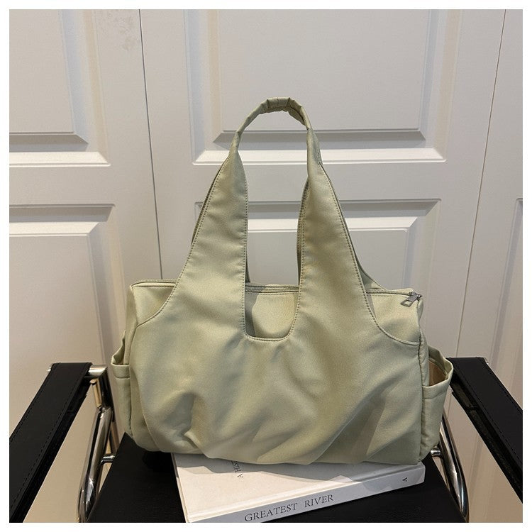 Fashionable Multi-Pocket Handbag
