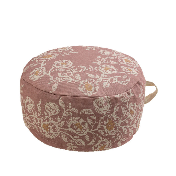 Round seat pouf with floral jacquard weave, stable upholstery core, and carrying handle Kalsten
