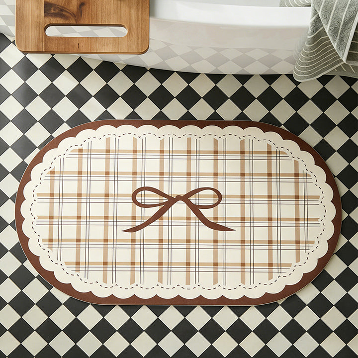 Rectangular wipeable placemat with checked pattern, wavy decorative edge and bow motif Kalsten
