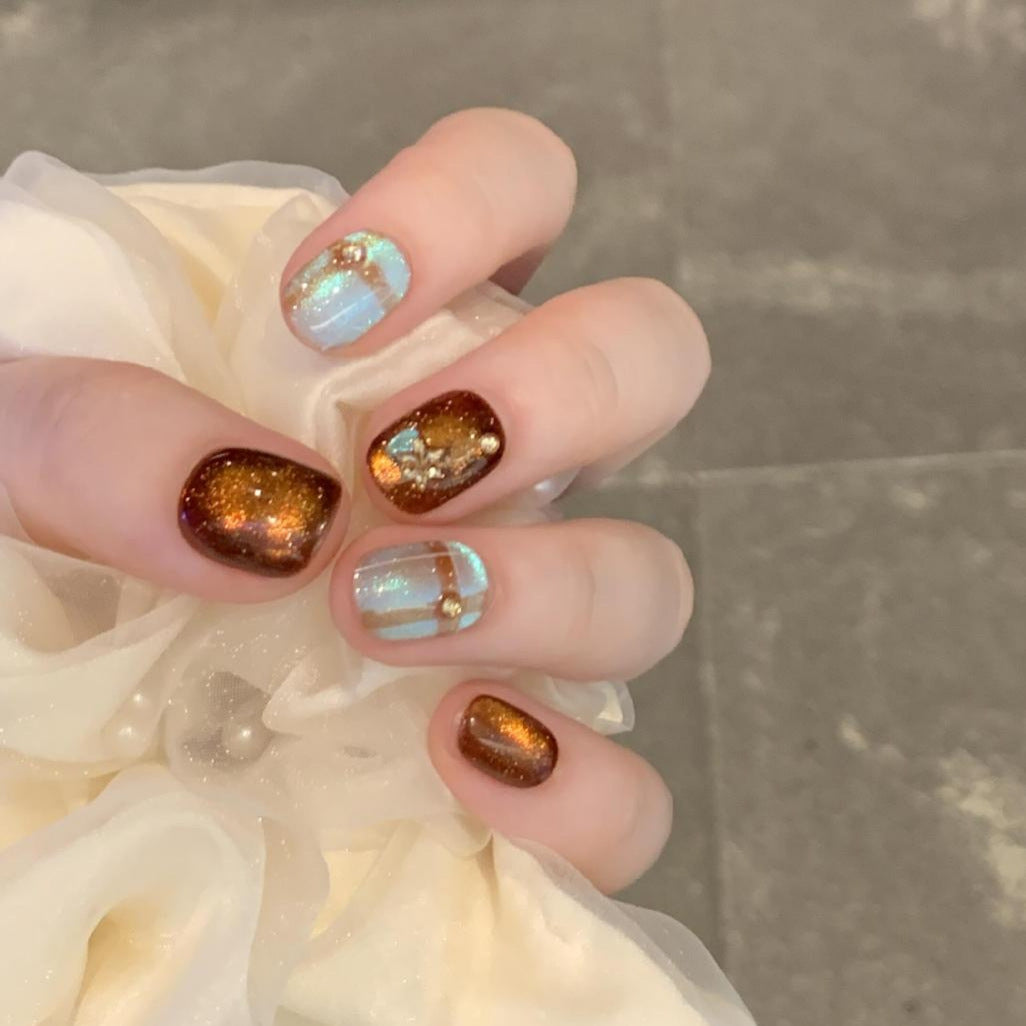 Artificial nail art tips with shimmer and glitter Kalsten