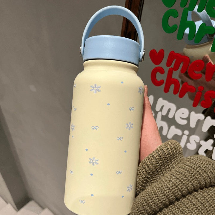 Women's insulated drinking bottle with practical carrying handle and cheerful design Kalsten