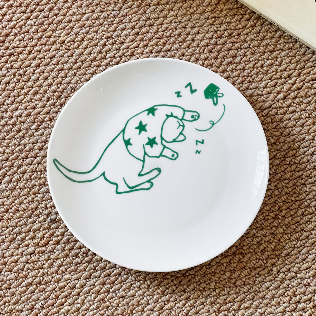 Handcrafted ceramic plate with illustrative cat design