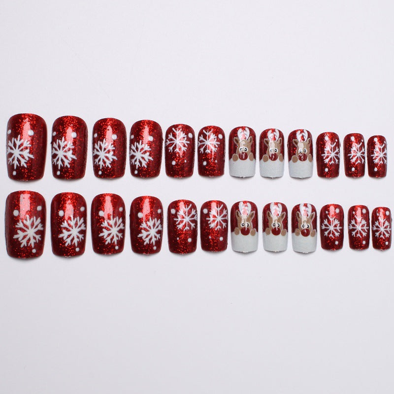 Creative artificial nails with festive reindeer design Kalsten