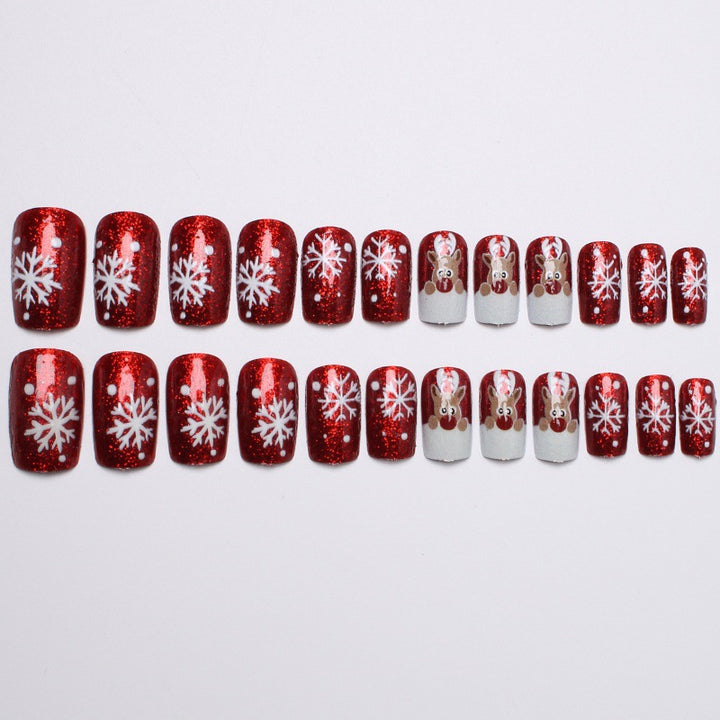 Creative artificial nails with festive reindeer design Kalsten