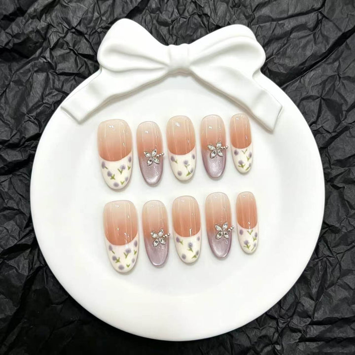 Artistic Press-On Nail Design Set with Floral Embellishments