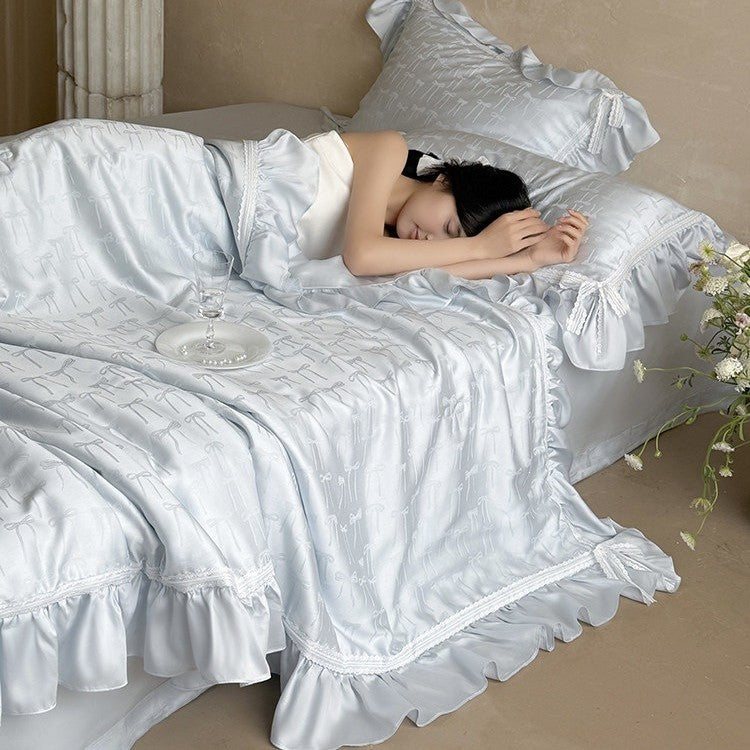 Satin bedding set with jacquard bow relief, gathered ruffle and lace trim