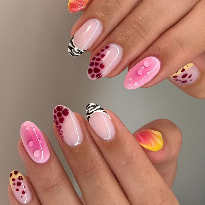 Creative artificial nails with floral design and glitter accents Kalsten