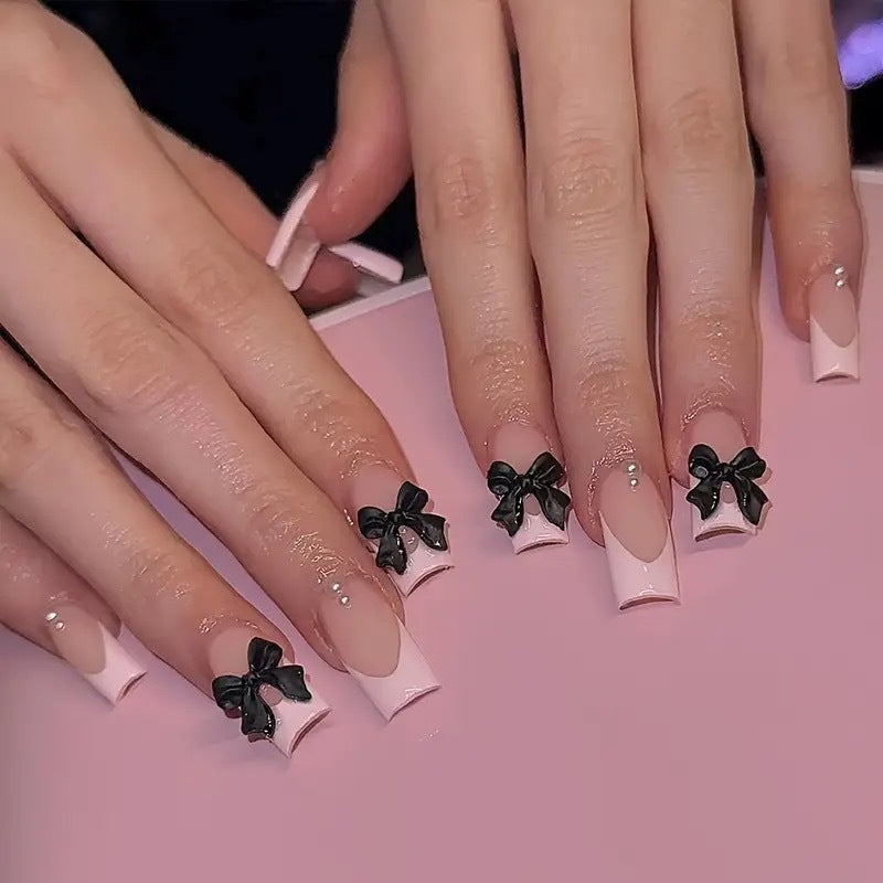Stylish artificial nails with bow details Kalsten