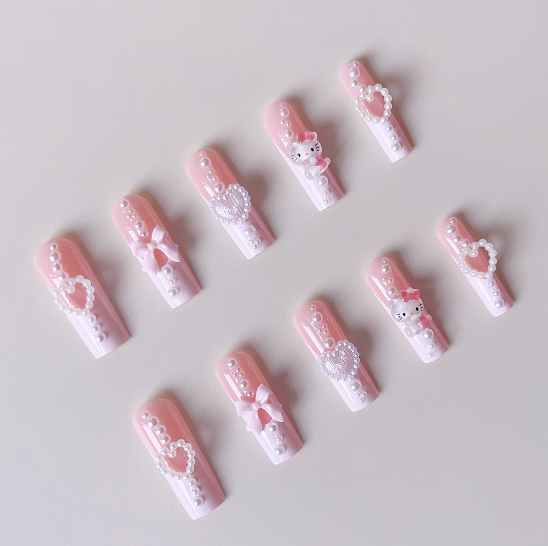 Artificial nail set with playful 3D care and pearl decorations Kalsten