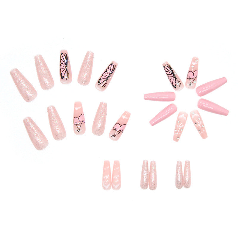 Artificial nail set with romantic butterfly designs and glitter accents Kalsten