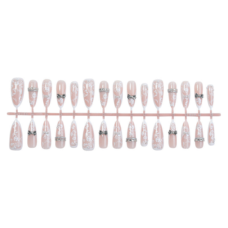 Artificial nail set with romantic floral design and sparkling accents Kalsten