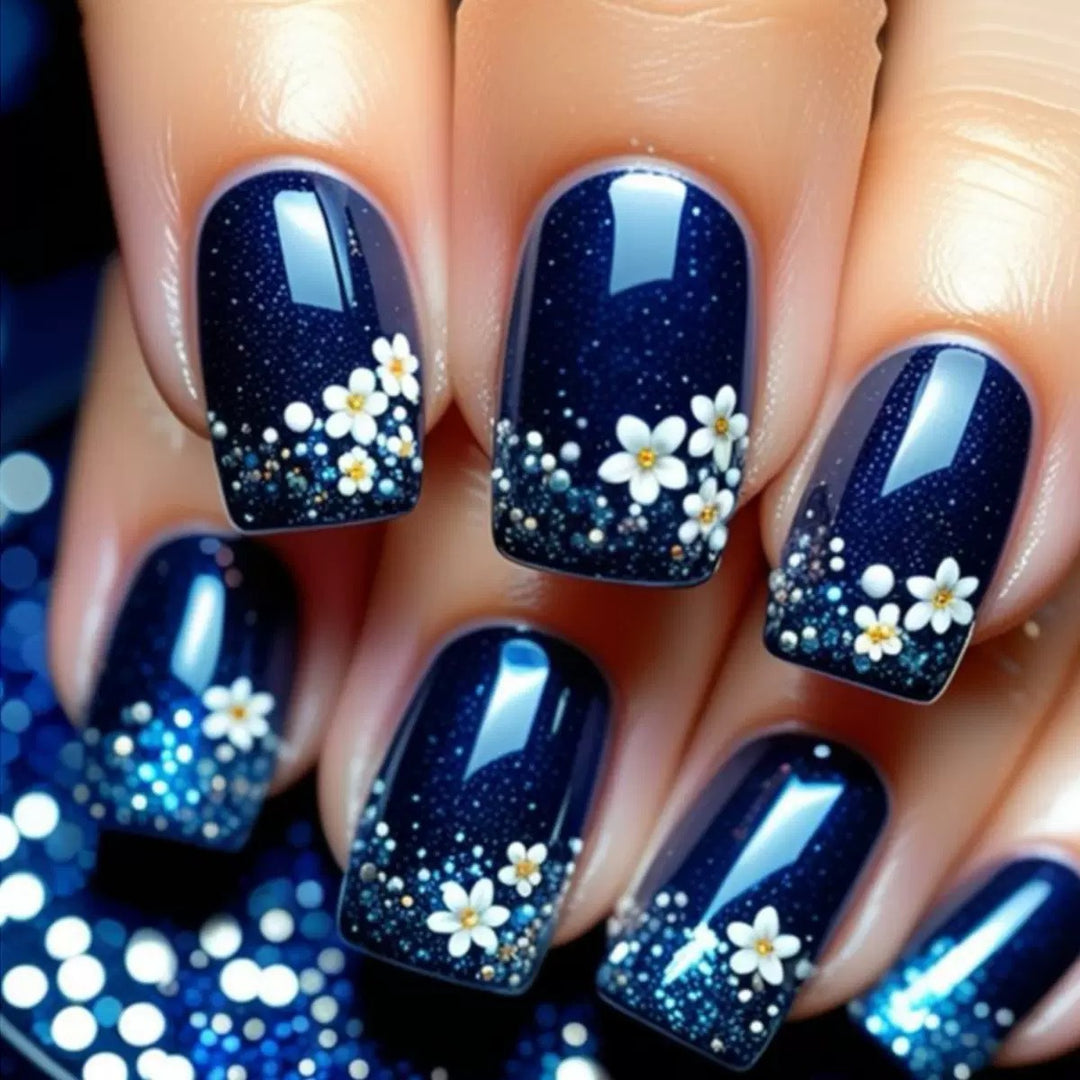 Acrylic nail set with elegant flower design and glitter accents Kalsten