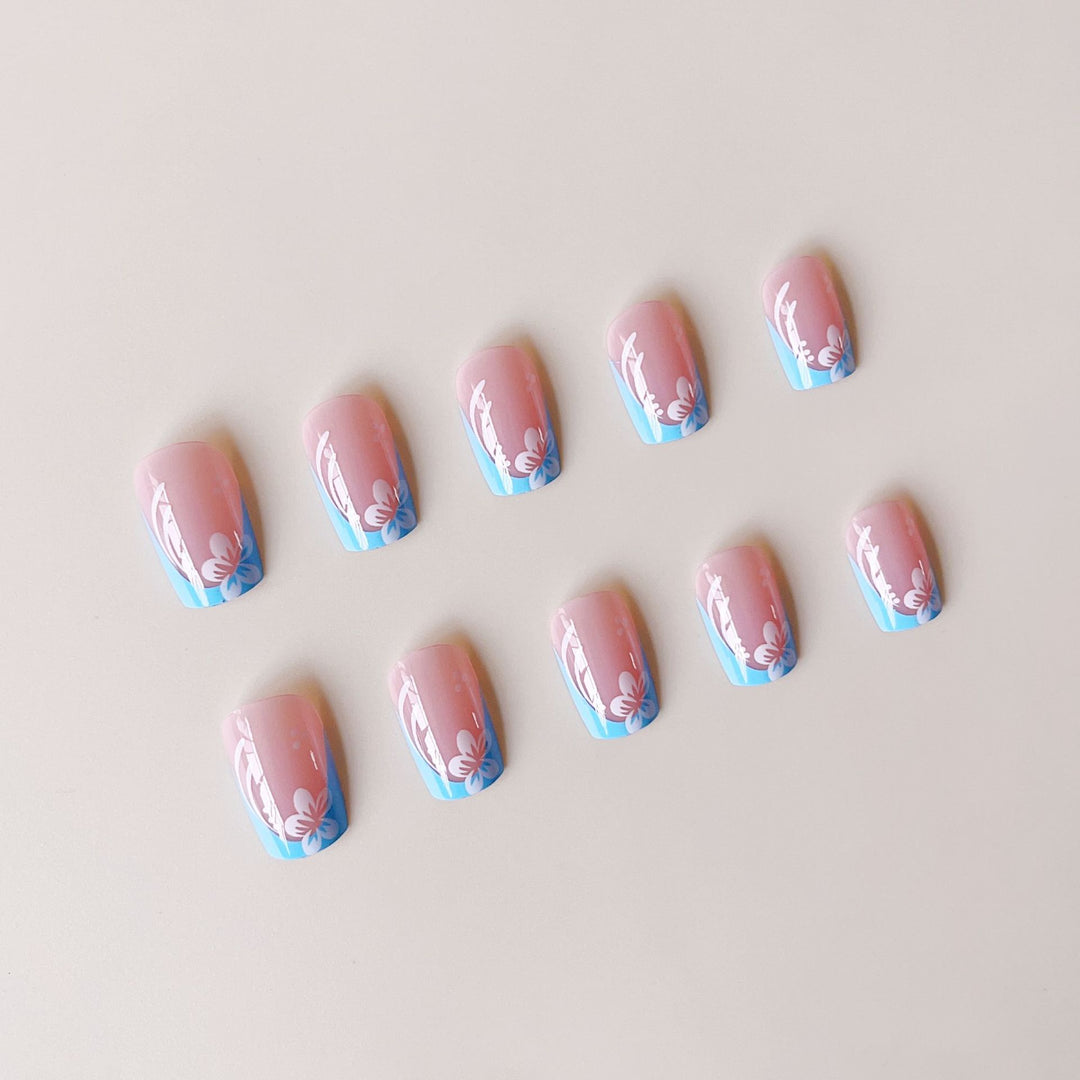 Acrylic nail set with floral designs and elegant tips Kalsten
