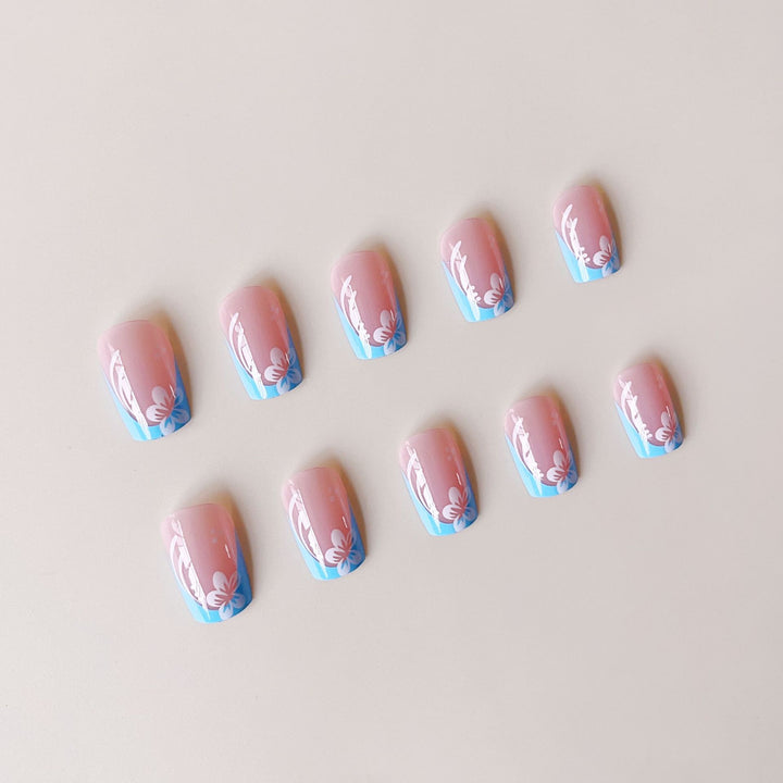 Acrylic nail set with floral designs and elegant tips Kalsten