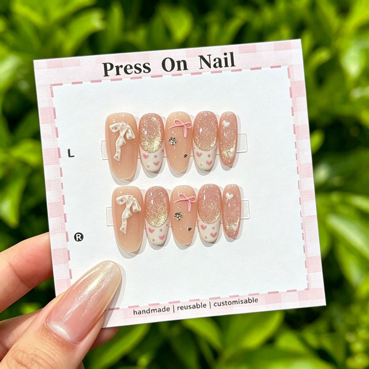 Artistic Press-On Nail Art Set with Cute Character and Bow Accents