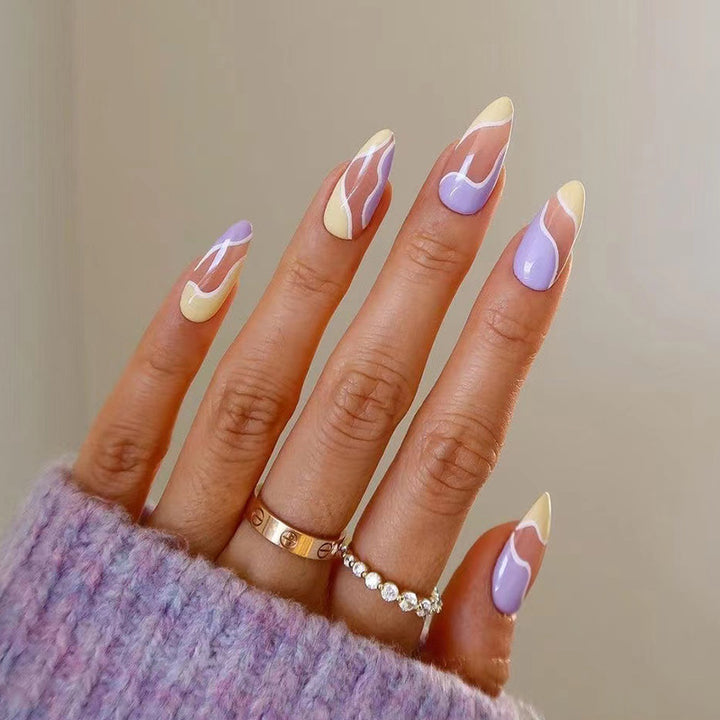 Artful Nail Extensions with Wave Design and Colorful Accents Kalsten
