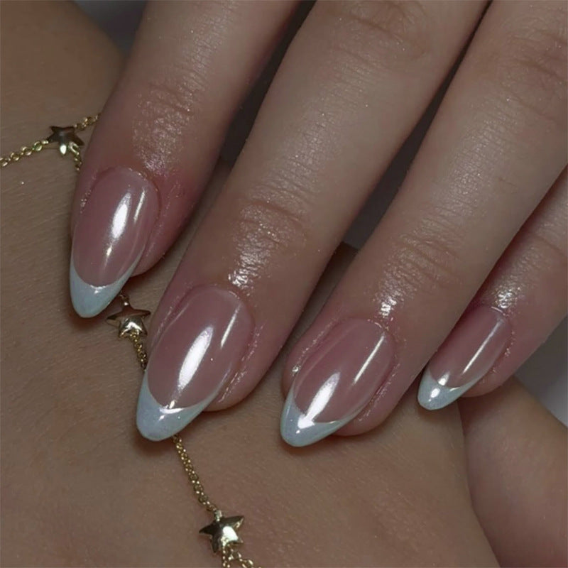 Elegant stiletto nails with high-gloss French tip design Kalsten