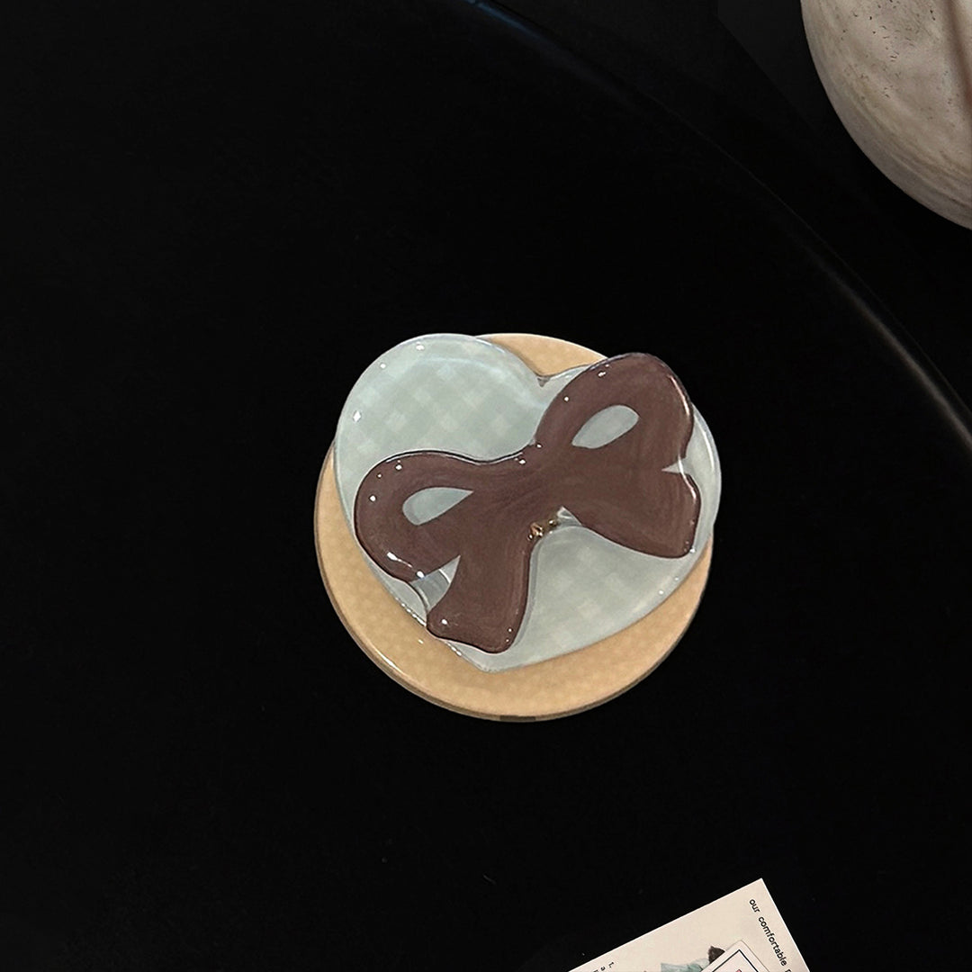 Decorative ceramic coaster with bow motif Kalsten