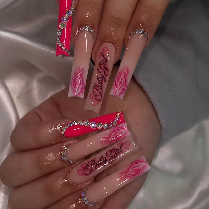 Artificial nail art with luxurious rhinestone and flower decorations Kalsten