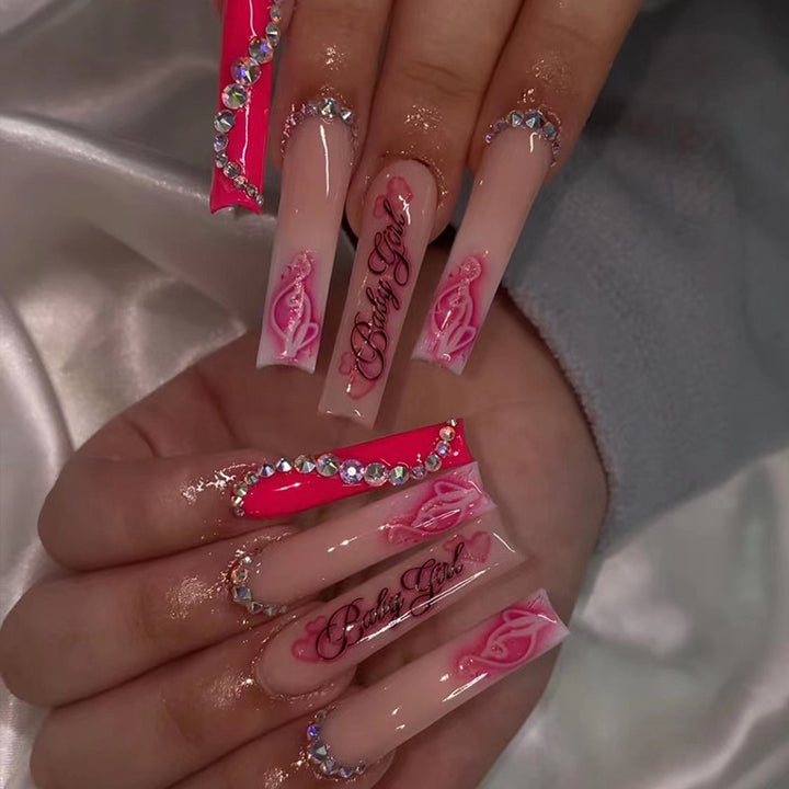 Artificial nail art with luxurious rhinestone and flower decorations Kalsten