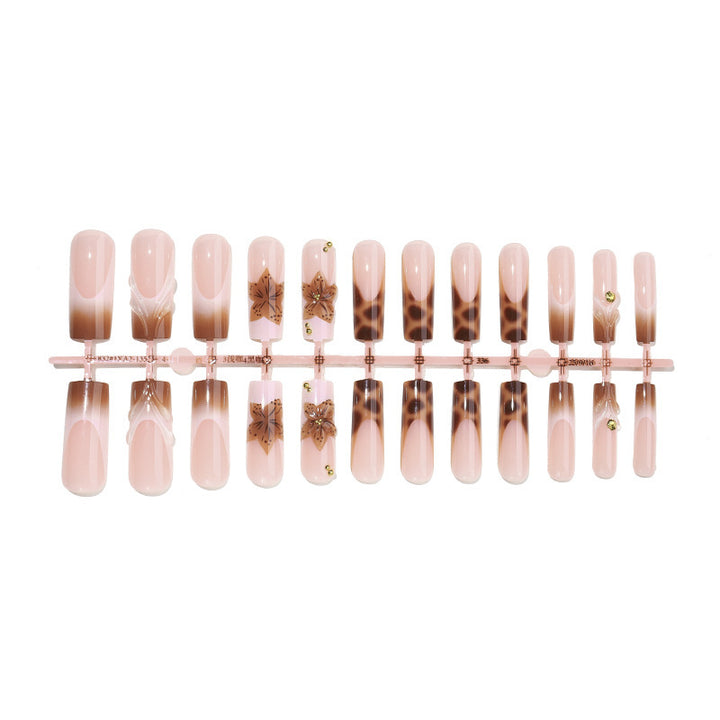 Creative nail art set with floral accents and ombre effect Kalsten