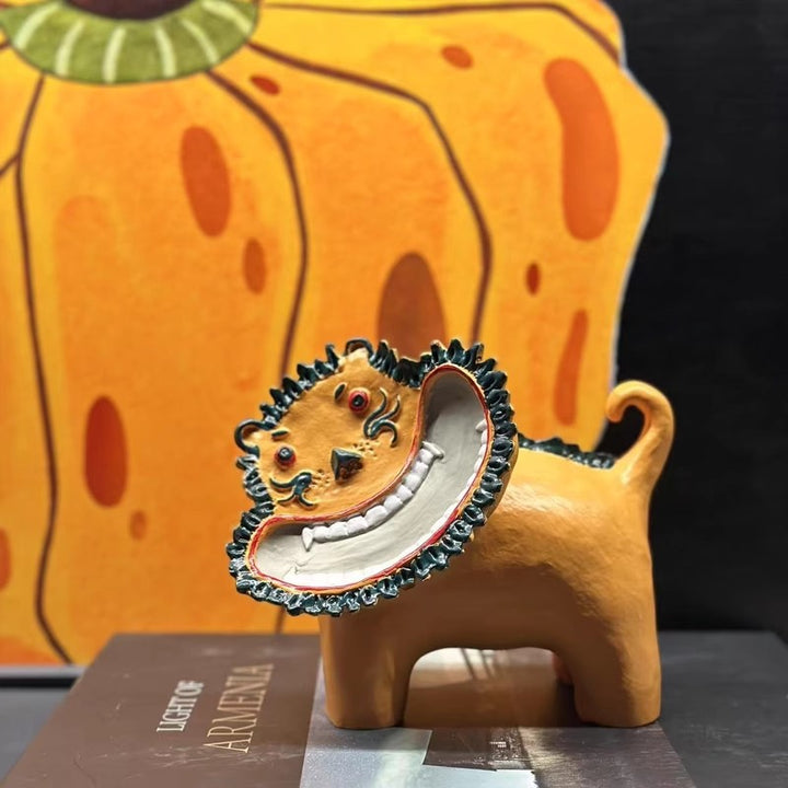 Playful Ceramic Lion Figurine