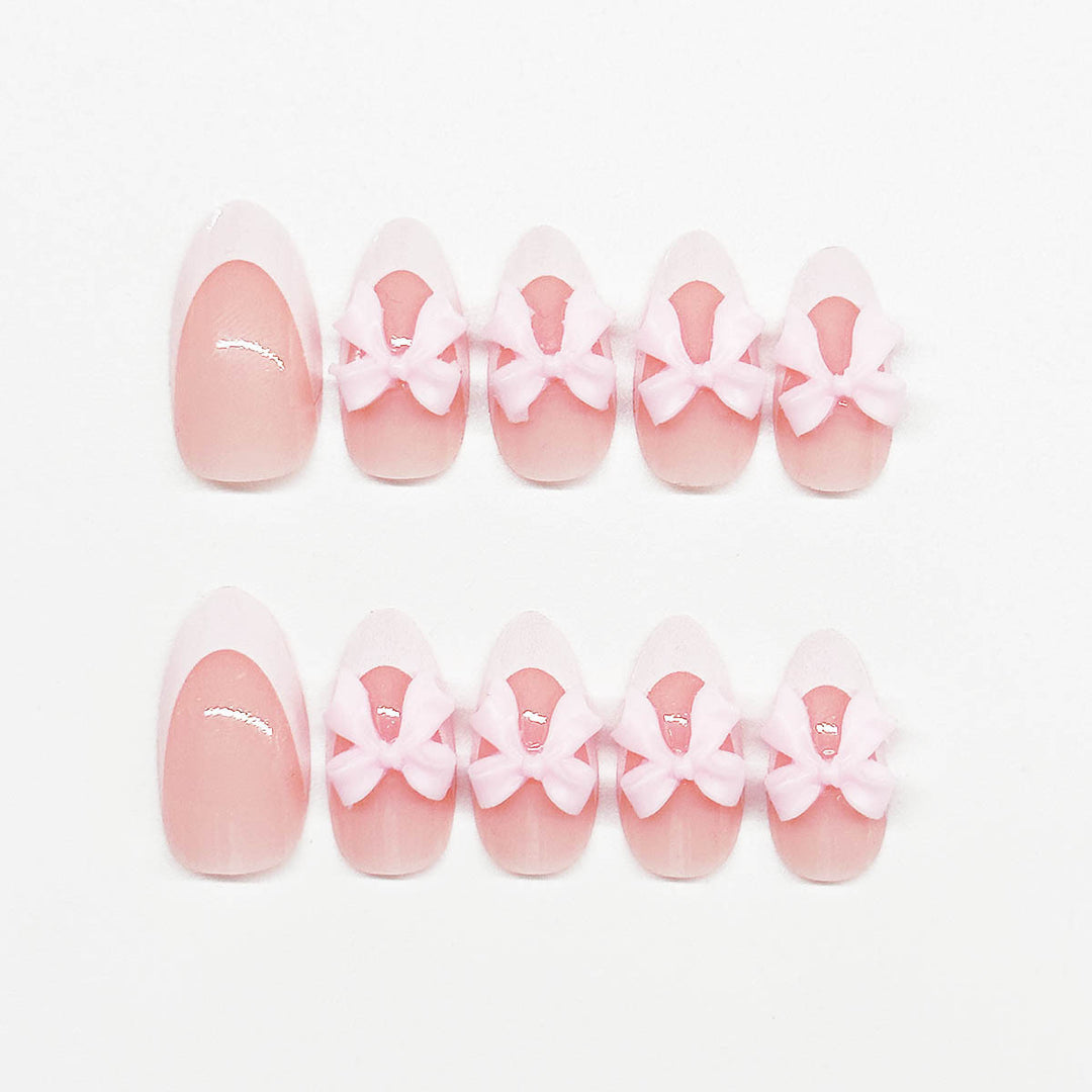 Nail art set with playful bow accents Kalsten