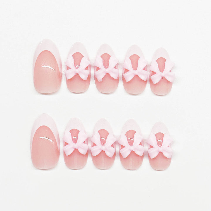 Nail art set with playful bow accents Kalsten