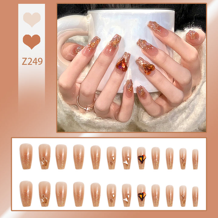 Artificial nail set with glitter and heart accents Kalsten