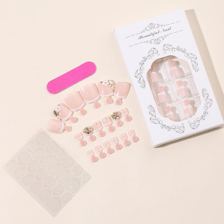 Acrylic nail set with elegant glitter and flower details Kalsten