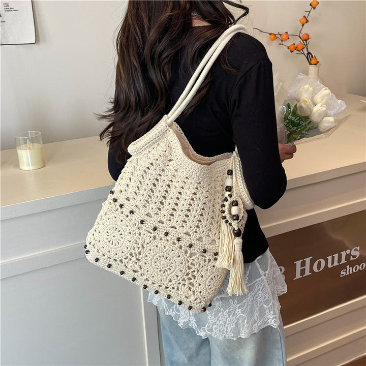 Macrame Drawstring Bag with Playful Tassels and Furniture Structure Kalsten