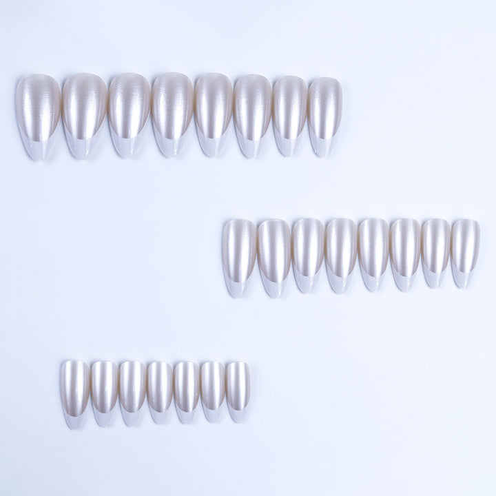 Artificial nails in elegant French tip design Kalsten