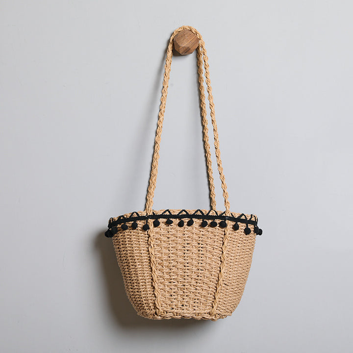 Delicate beach bag with pompons Kalsten