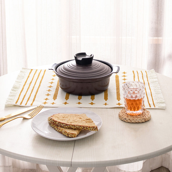 Woven placemat made of cotton blend with geometric diamond trim and fine texture Kalsten