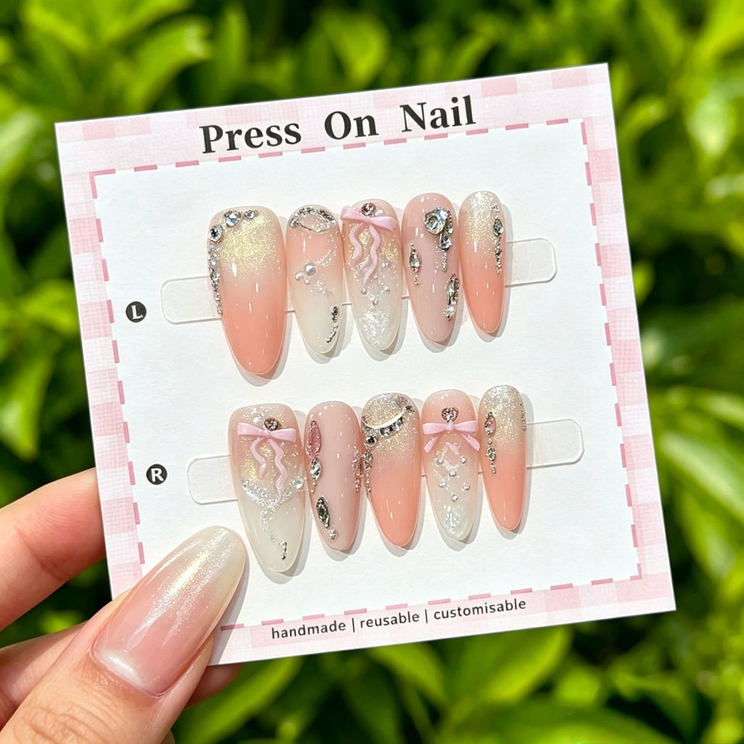 Artistic Press-On Nail Art Set with Cute Character and Bow Accents