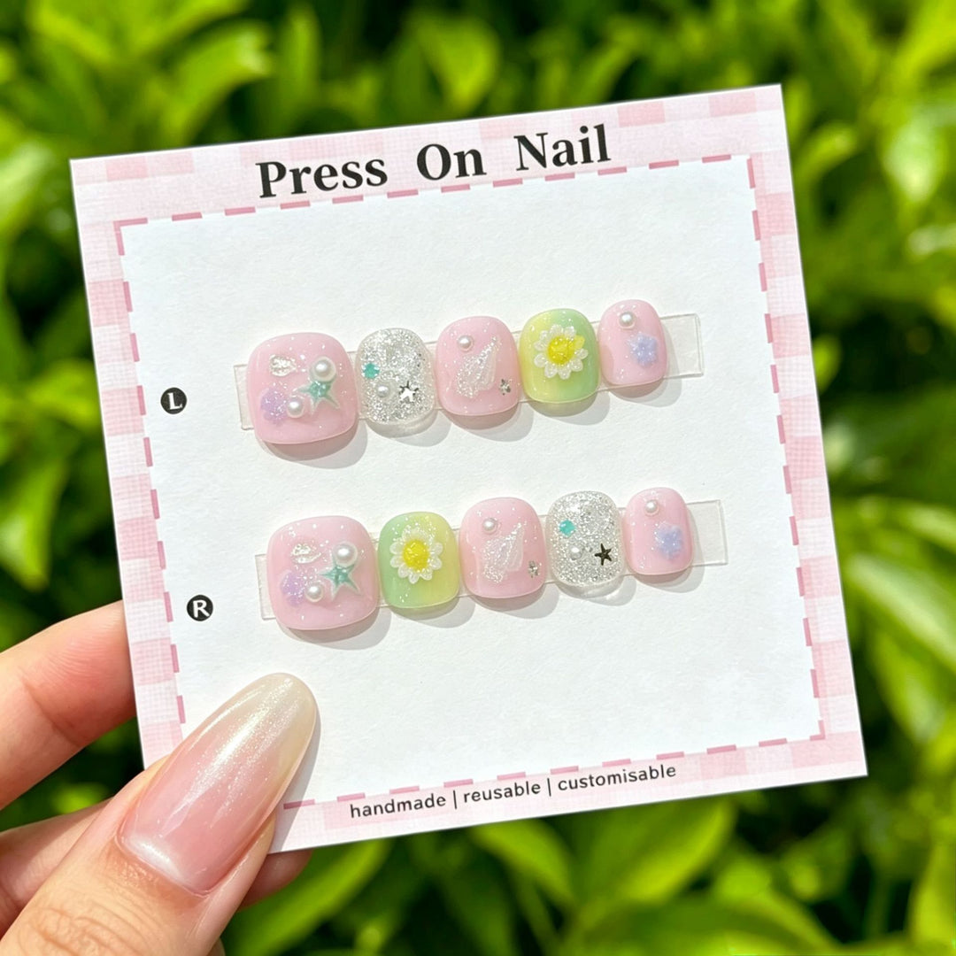 Artistic Press-On Nail Set with Floral and Graphic Designs