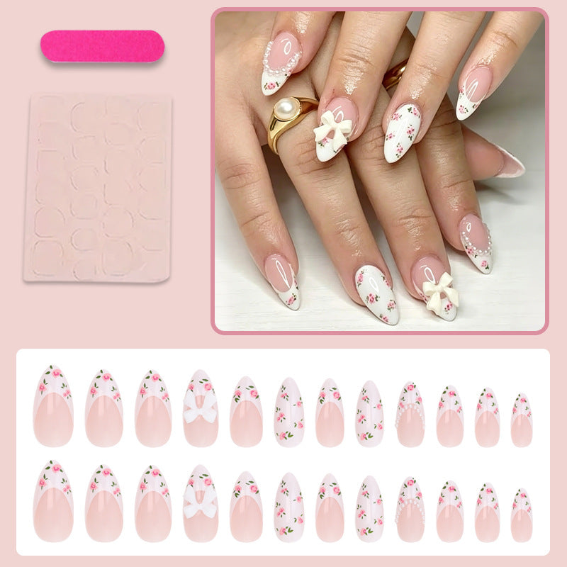 Artificial nail set with romantic flower motifs and elegant details Kalsten