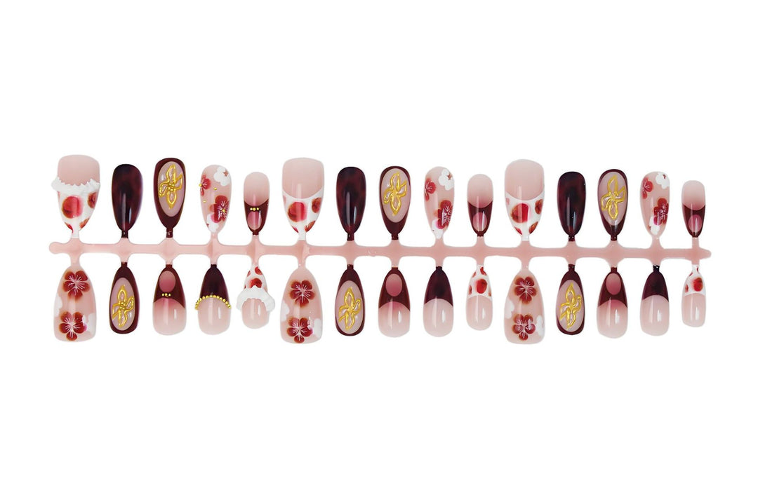 Artificial nail set with luxurious floral designs and glitter accents Kalsten
