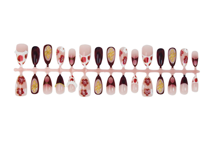 Artificial nail set with luxurious floral designs and glitter accents Kalsten