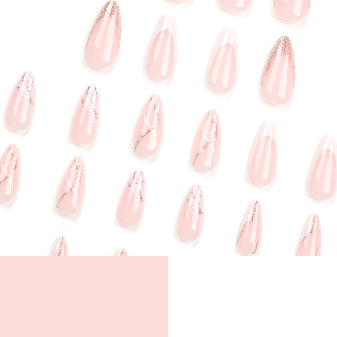 Artful stiletto nails with elegant marble and glitter design Kalsten