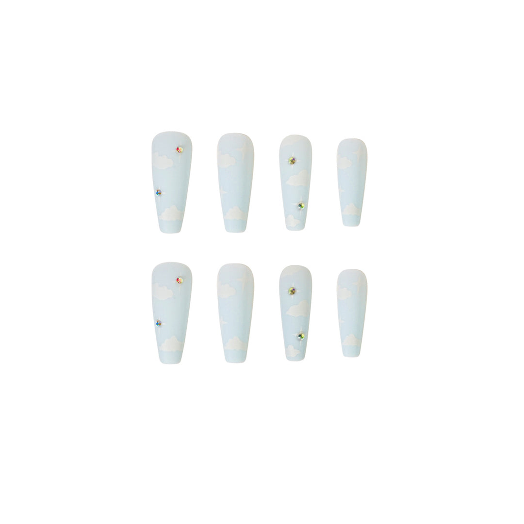Creative nail art in cloud design with glitter accents Kalsten