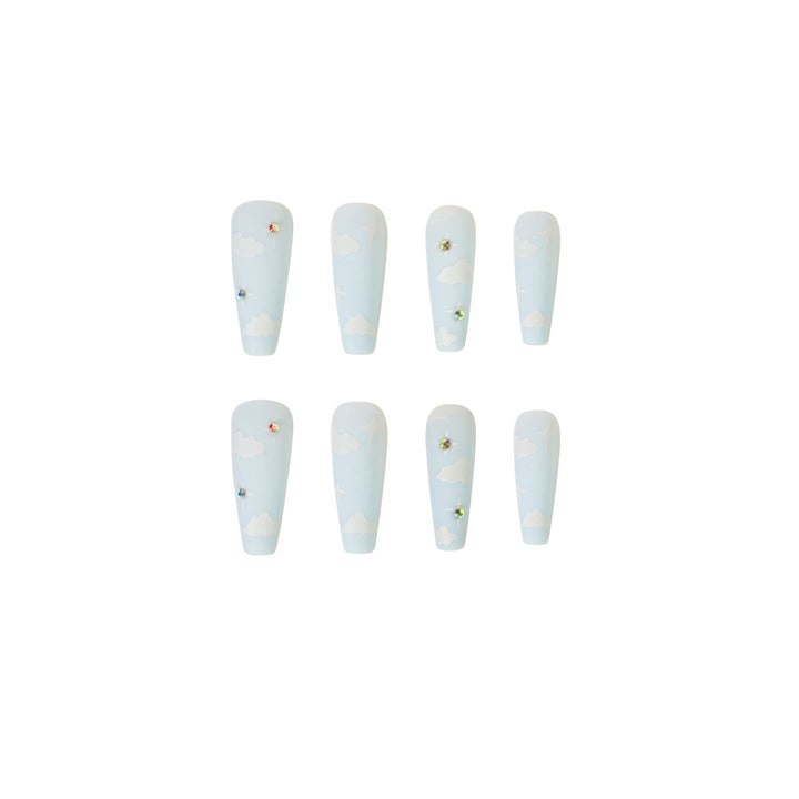 Creative nail art in cloud design with glitter accents Kalsten