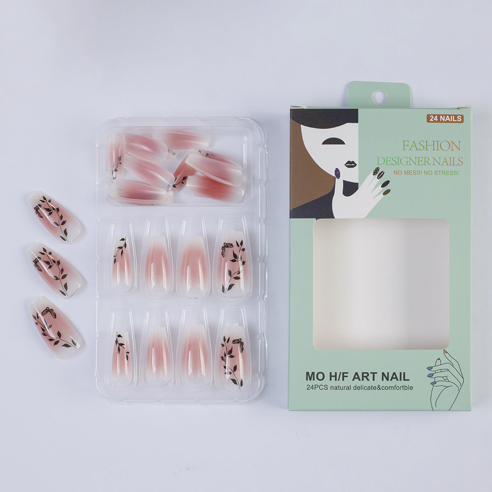 Press-on nails in elegant ombre design with floral accents Kalsten